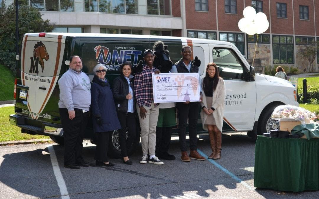 NET Presenting a Check to Marywood University